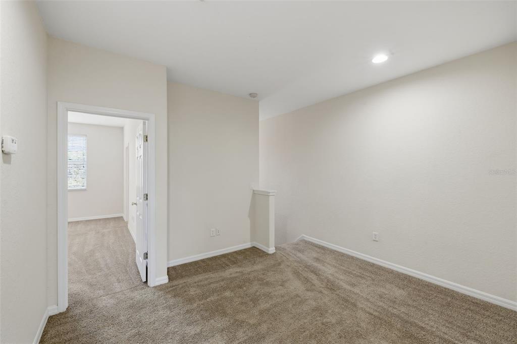 3914 Silverlake Way Wesley Chapel, FL 33544 - Photo 11 of 38 a view of an empty room