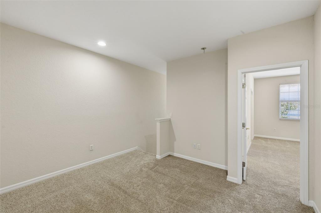 3914 Silverlake Way Wesley Chapel, FL 33544 - Photo 10 of 38 an empty room with a empty space
