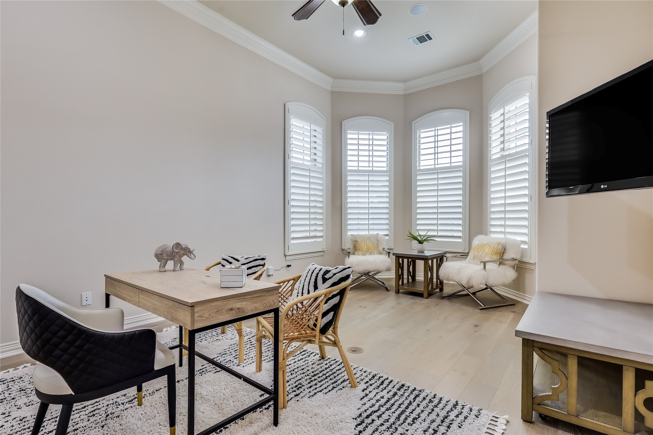 408 Ridgetop Bend Cedar Park, TX 78613 - Photo 19 of 40 A refined study featuring abundant natural light, crown molding, and polished hardwood flooring.