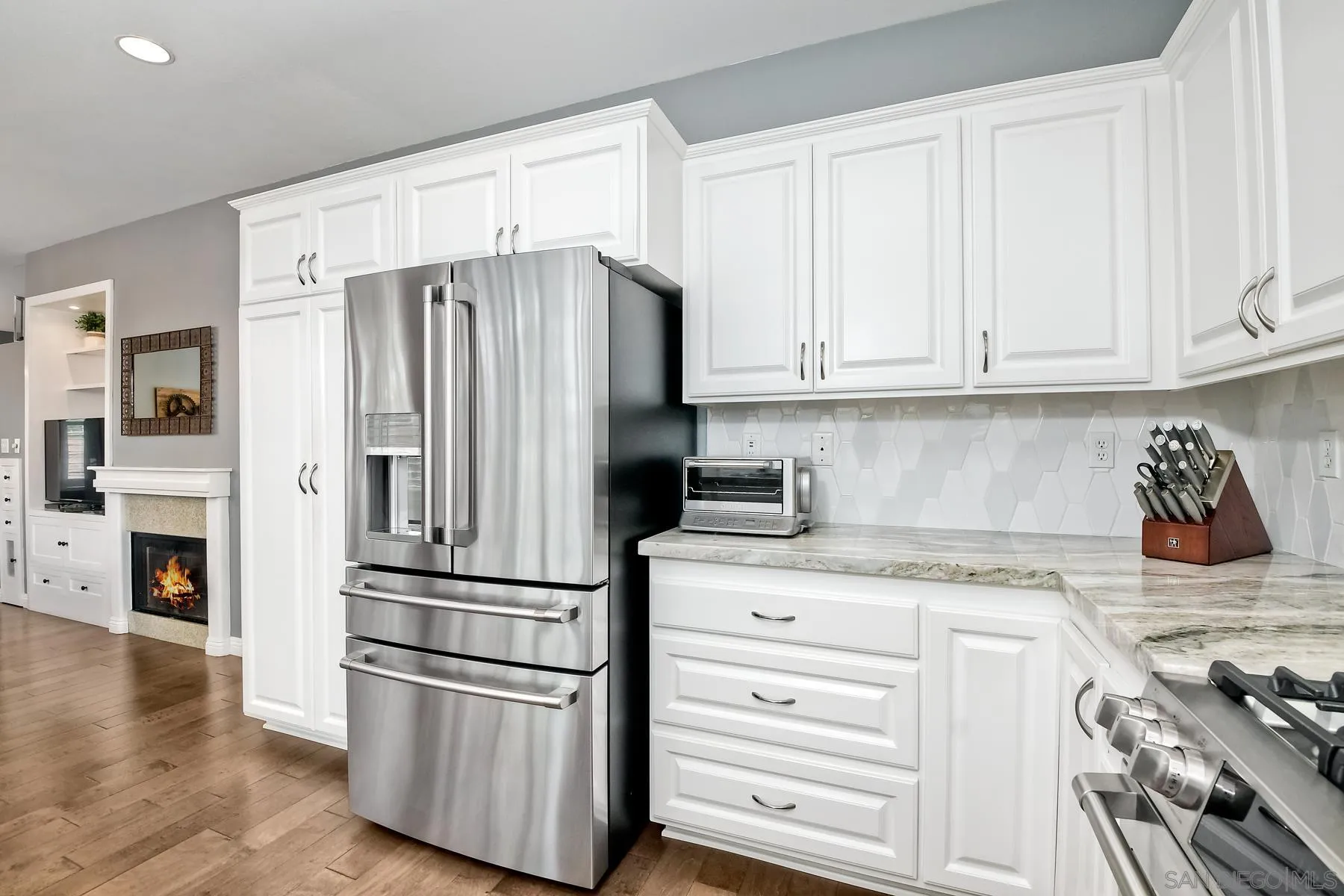 1145 Monterey Place Encinitas, CA 92024 - Photo 17 of 34 a kitchen with stainless steel appliances granite countertop a refrigerator and a stove top oven