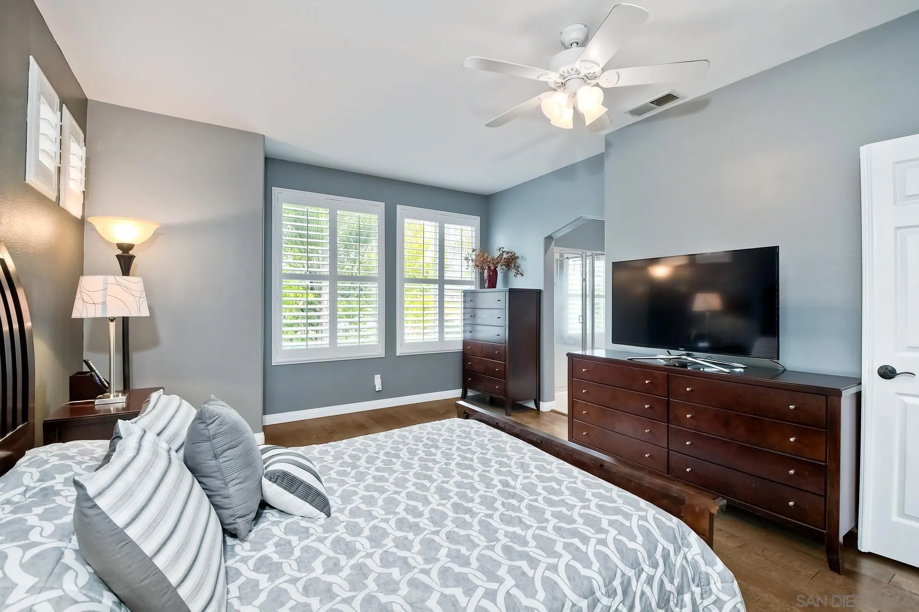 1145 Monterey Place Encinitas, CA 92024 - Photo 26 of 34 a bedroom with a bed and a flat screen tv