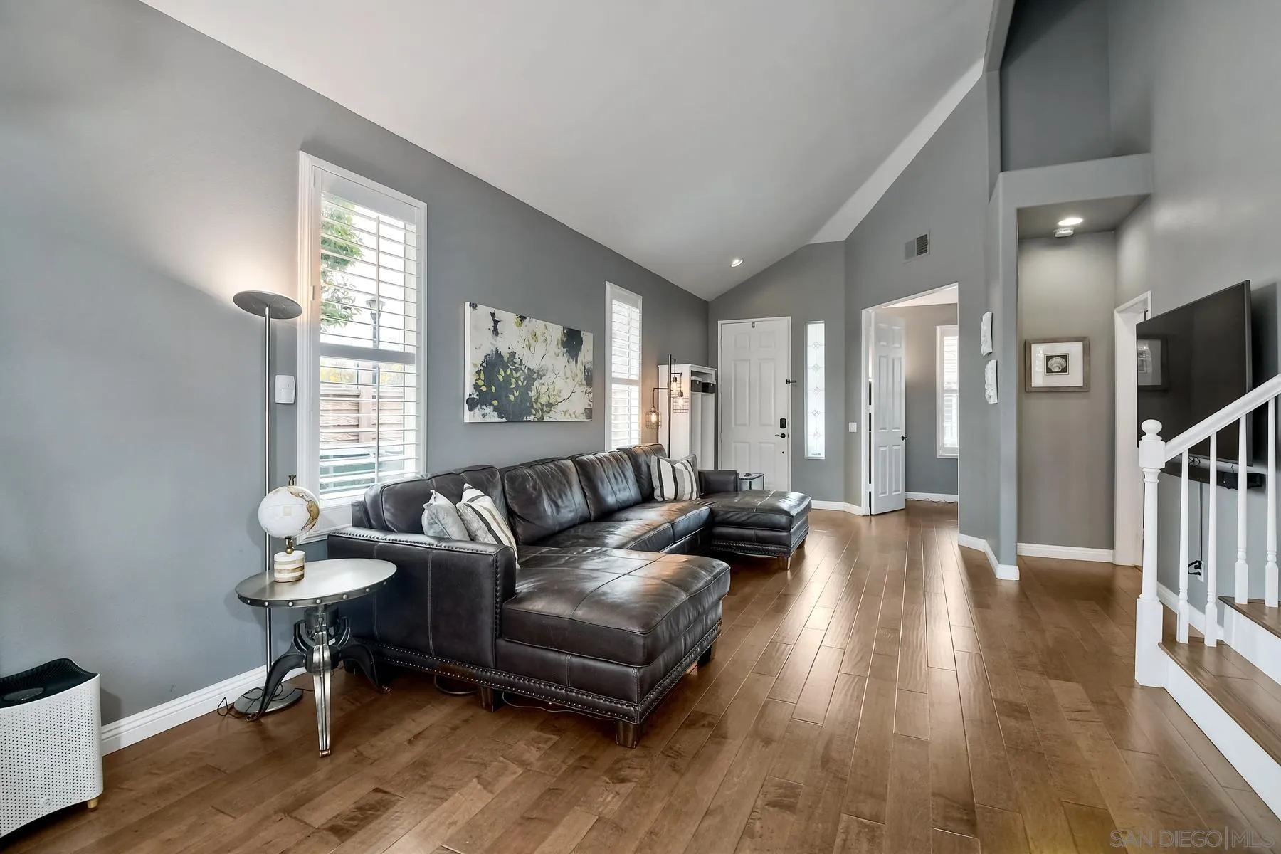 1145 Monterey Place Encinitas, CA 92024 - Photo 9 of 34 a living room with furniture and a wooden floor