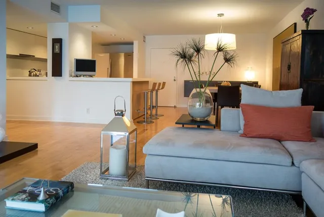 a room with furniture and clutter