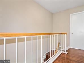 14727 McKnew Road Burtonsville, MD 20866 - Photo 15 of 20 a view of a room with wooden floor and windows