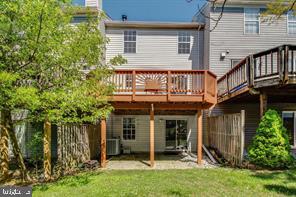 14727 McKnew Road Burtonsville, MD 20866 - Photo 19 of 20 a view of a house with a yard and plants