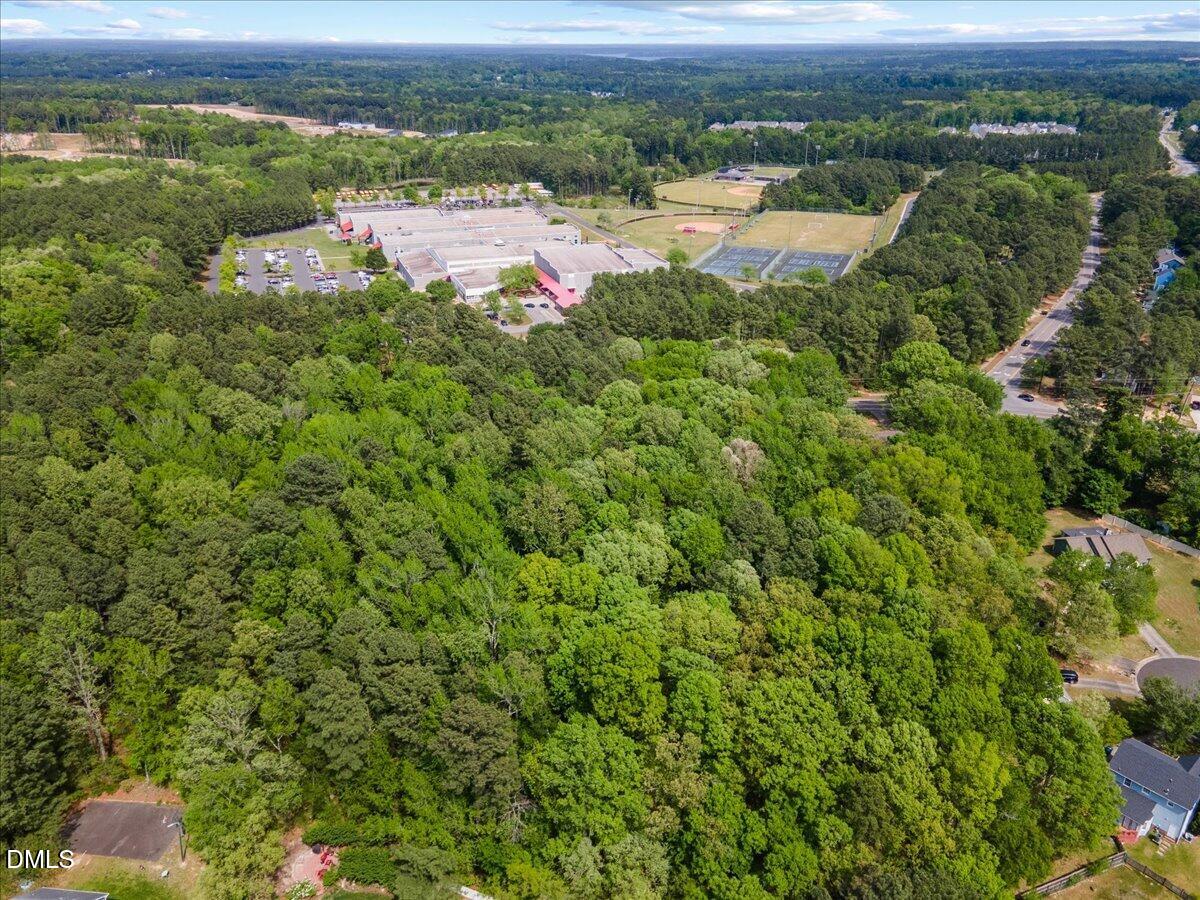 631-633 Clayton Road Durham, NC 27703 - Photo 8 of 17 an aerial view of residential houses with outdoor space and trees