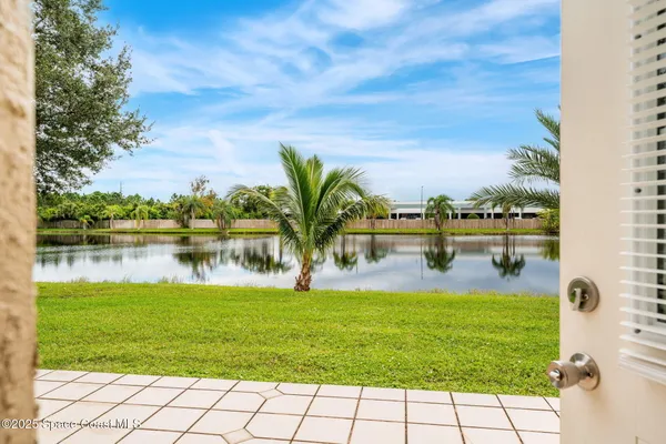 a view of a lake with a big yard
