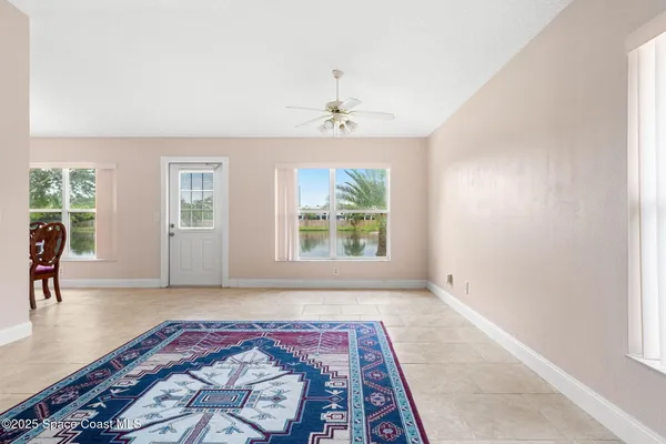 wooden floor in a room next to a window
