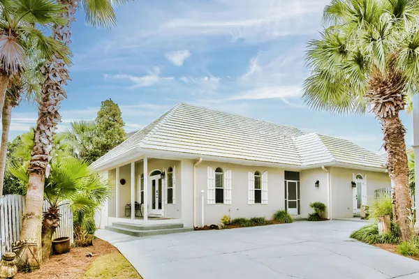 a front view of a house with a porch