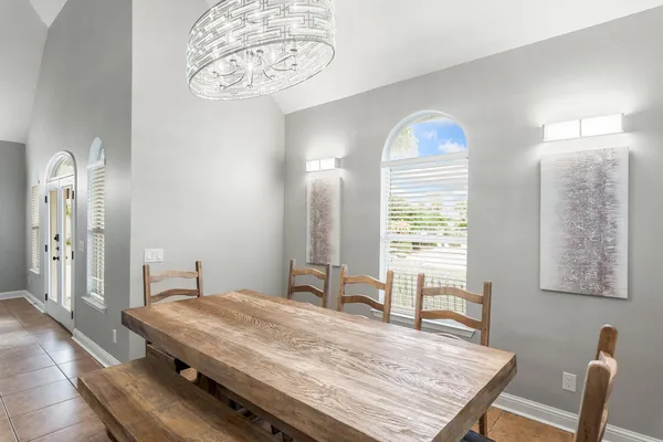 a bedroom with a bed and a table in it