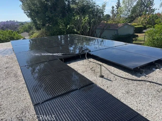 a view of balcony with wooden floor and outdoor space