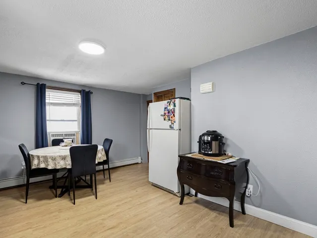 a room with furniture and a window