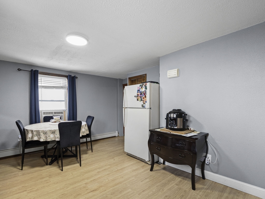 8 Clarks Court Lowell, MA 01852 - Photo 16 of 33 a room with furniture and a window