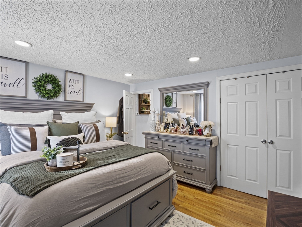 8 Clarks Court Lowell, MA 01852 - Photo 9 of 33 a bedroom with bed and window