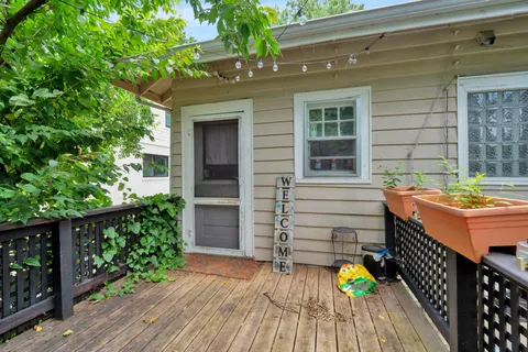 a backyard of a house with seating space