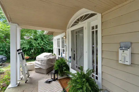 a porch with seating space