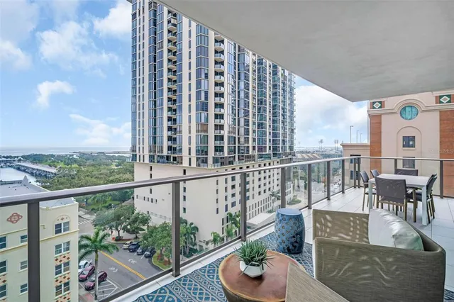 a bathroom with a double vanity sink toilet and shower