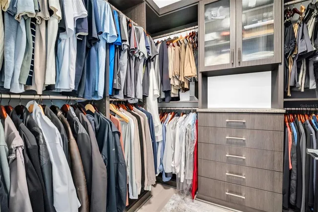a view of a patio with table and chairs and potted plants