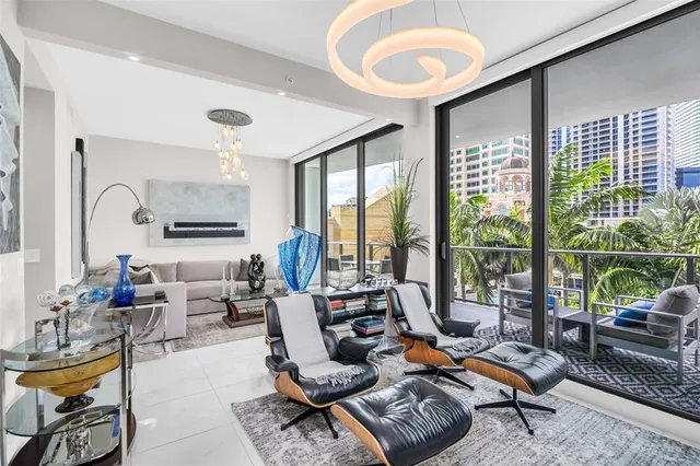 a view of a lobby with furniture and floor to ceiling window