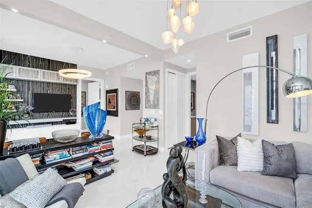 a view of swimming pool with outdoor seating