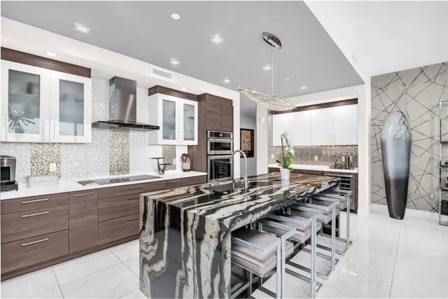 a living room with furniture and a mirror