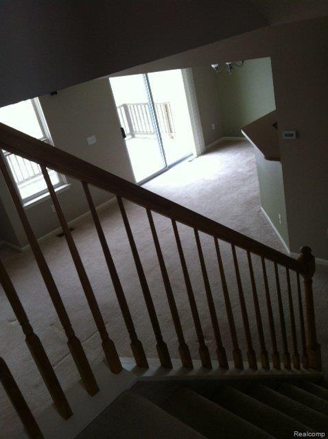 454 Lilly View Court Howell, MI 48843 - Photo 11 of 24 View from stairs to living-dinin