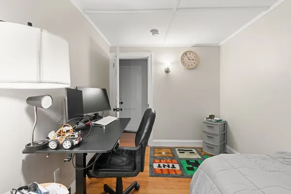 a view of a workspace with furniture