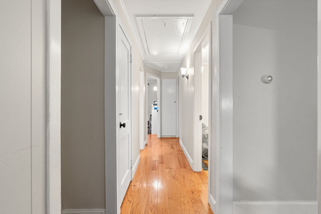 19 Cedar Street Beverly, MA 01915 - Photo 23 of 33 a view of a hallway with wooden floor