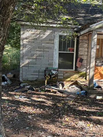 a view of garage with wooden door