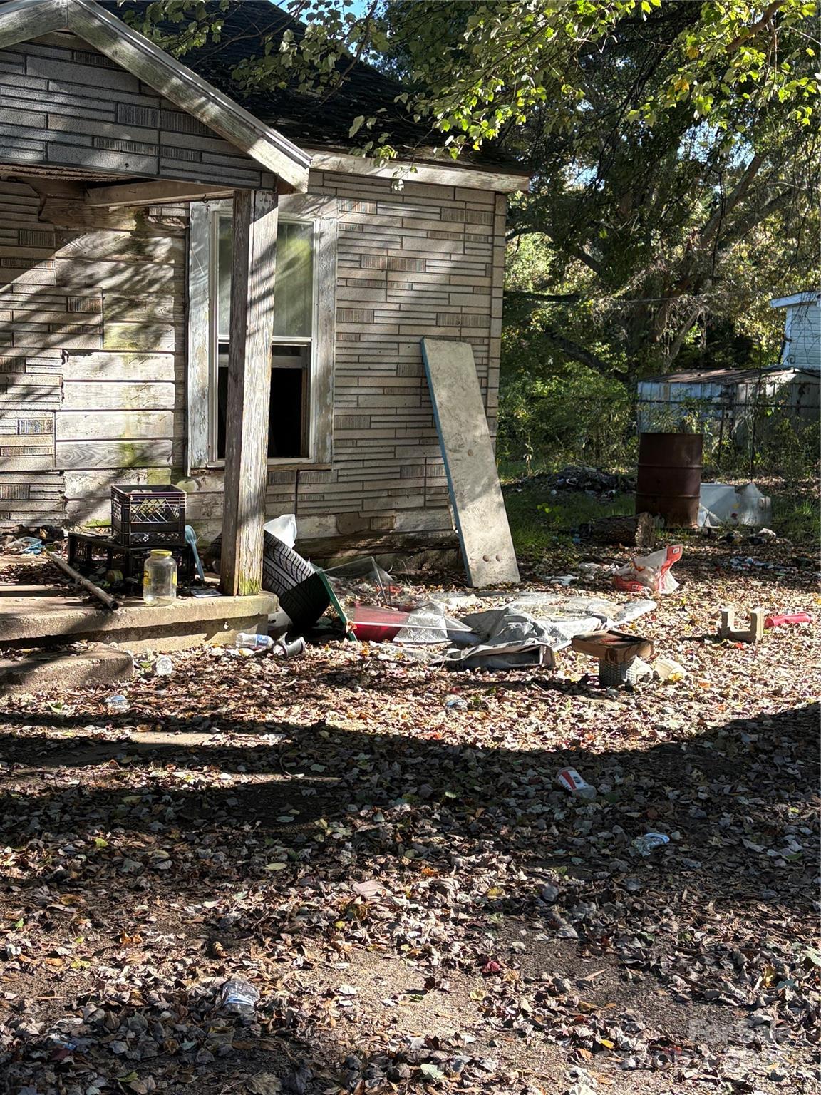 131 Autumn Leaf Road Troutman, NC 28166 - Photo 6 of 6 a backyard of a house