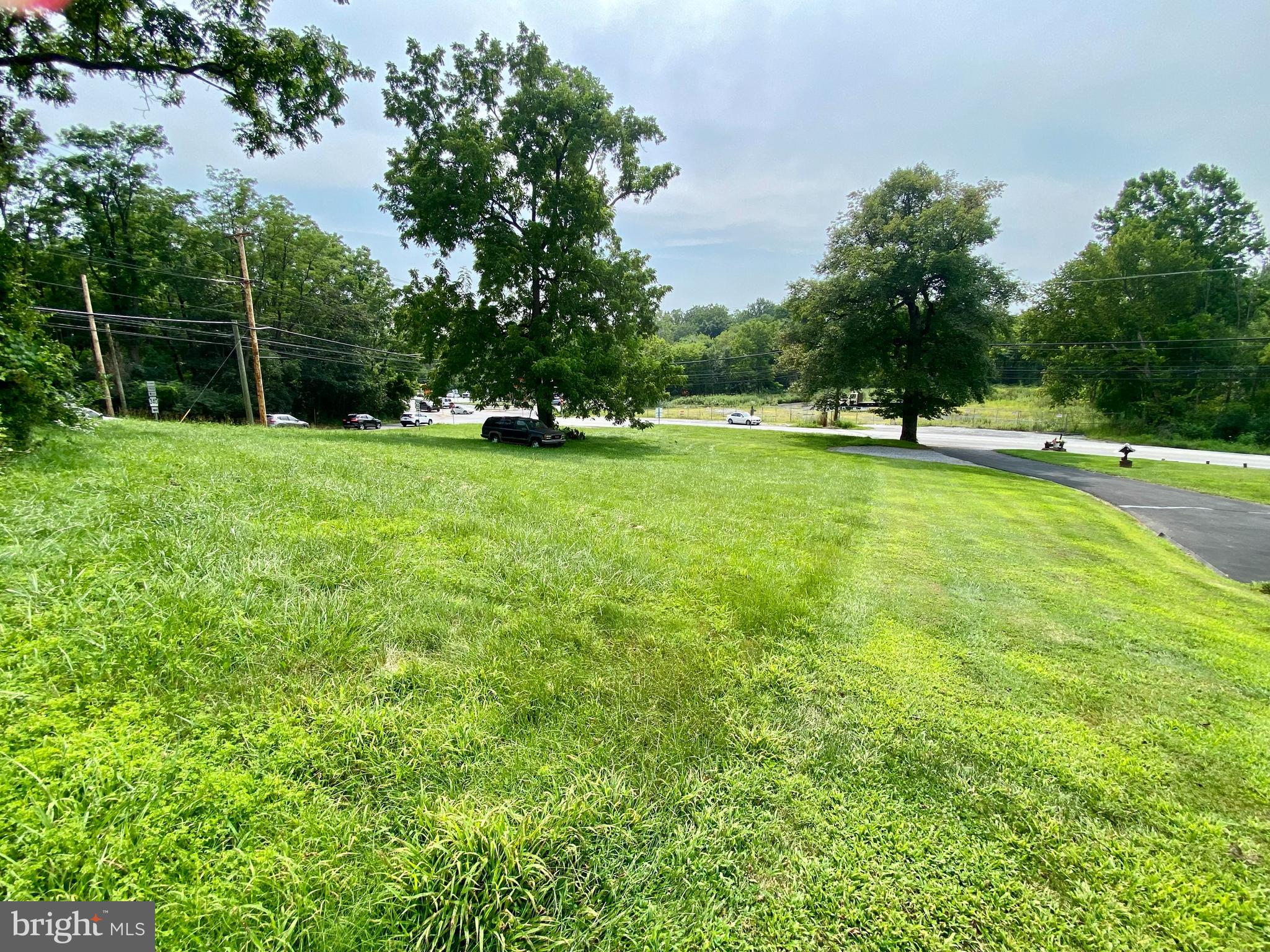 1101 South Manor Road Coatesville, PA 19320 - Photo 3 of 8 a view of a swimming pool with a yard