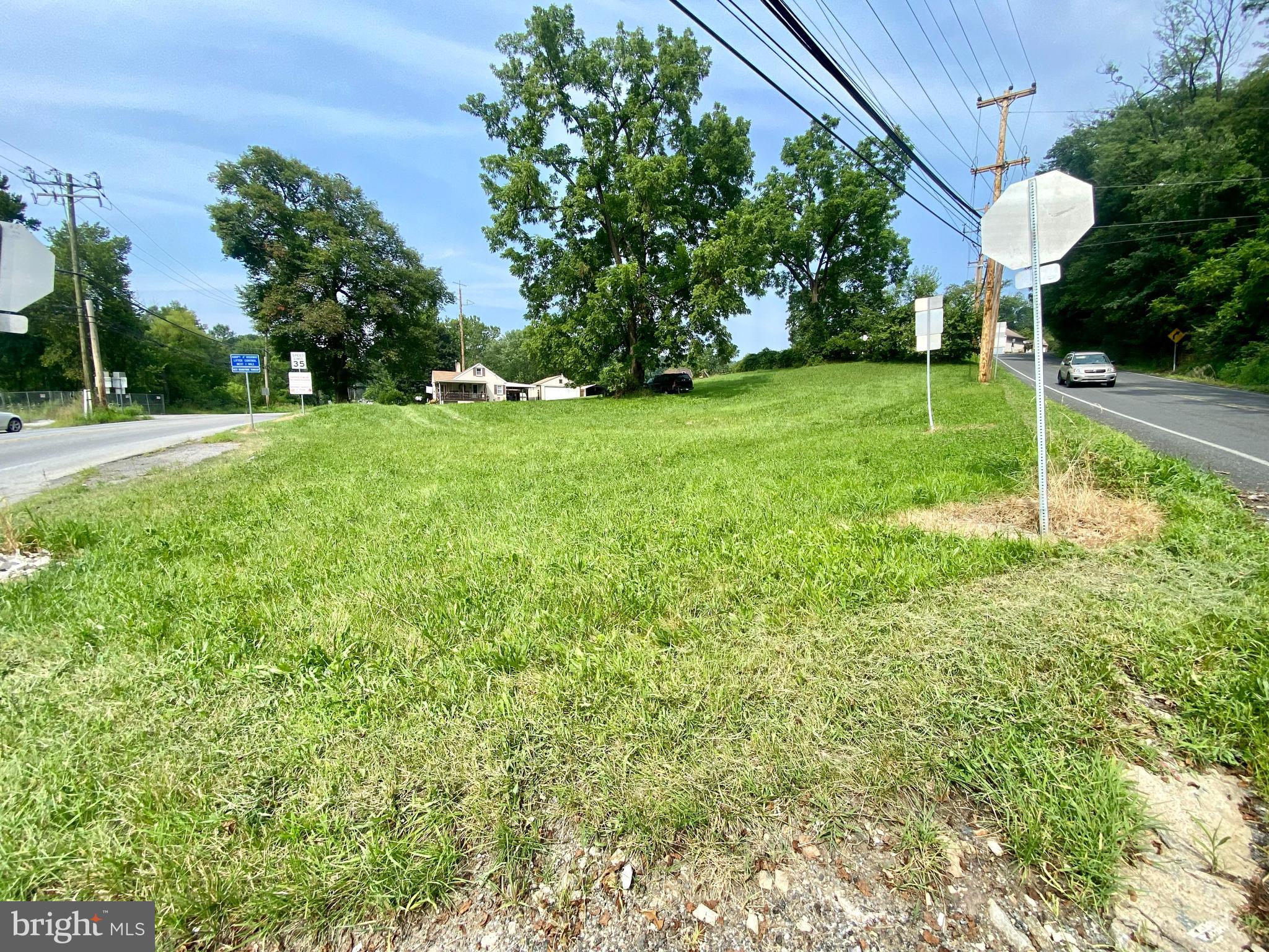 1101 South Manor Road Coatesville, PA 19320 - Photo 7 of 8 a backyard of a house with lots of green space