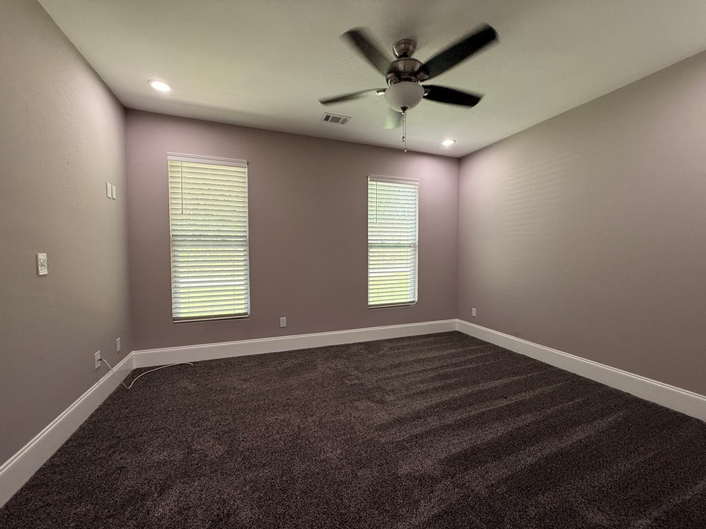 415 Autumn Ridge Drive Mineral Bluff, GA 30559 - Photo 11 of 21 an empty room with wooden floor and windows