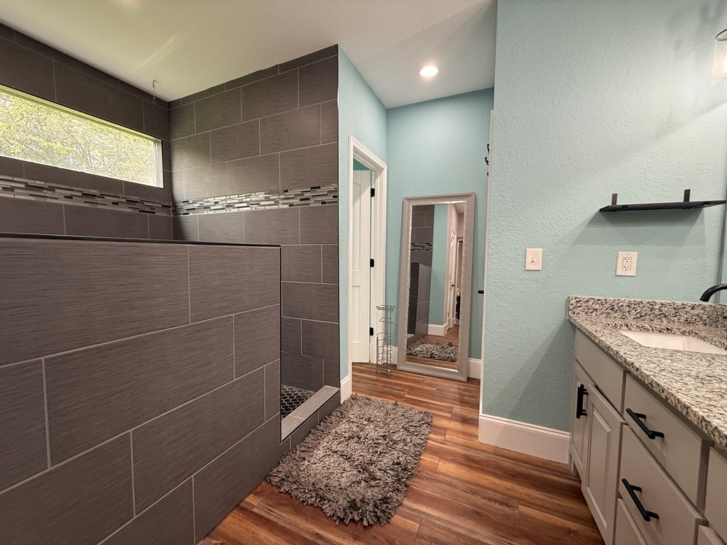 415 Autumn Ridge Drive Mineral Bluff, GA 30559 - Photo 16 of 21 a bathroom with a sink and a mirror
