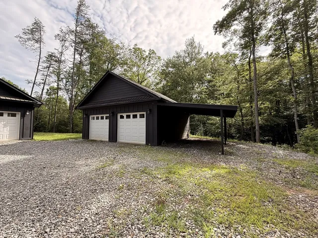 a house with trees in the background