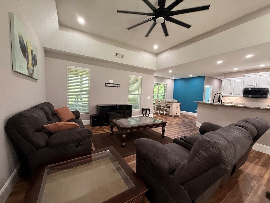 415 Autumn Ridge Drive Mineral Bluff, GA 30559 - Photo 4 of 21 a living room with furniture kitchen view and a window