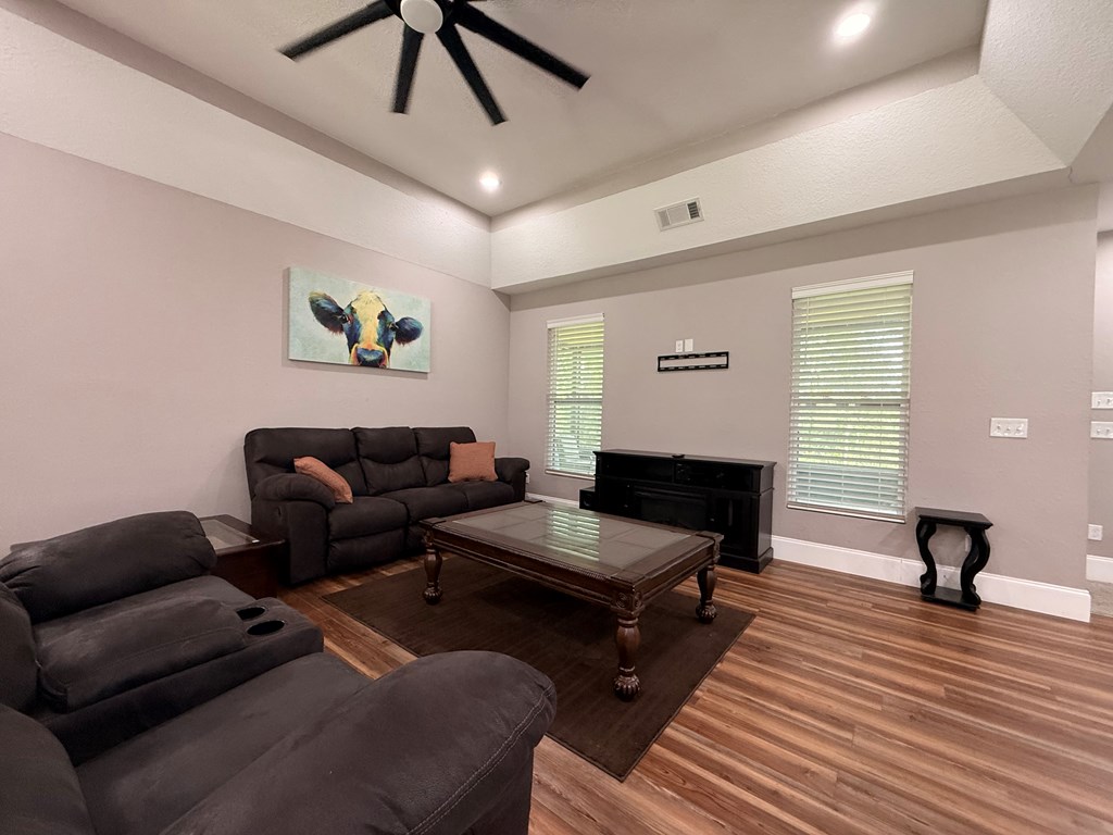 415 Autumn Ridge Drive Mineral Bluff, GA 30559 - Photo 5 of 21 a living room with furniture and a wooden floor