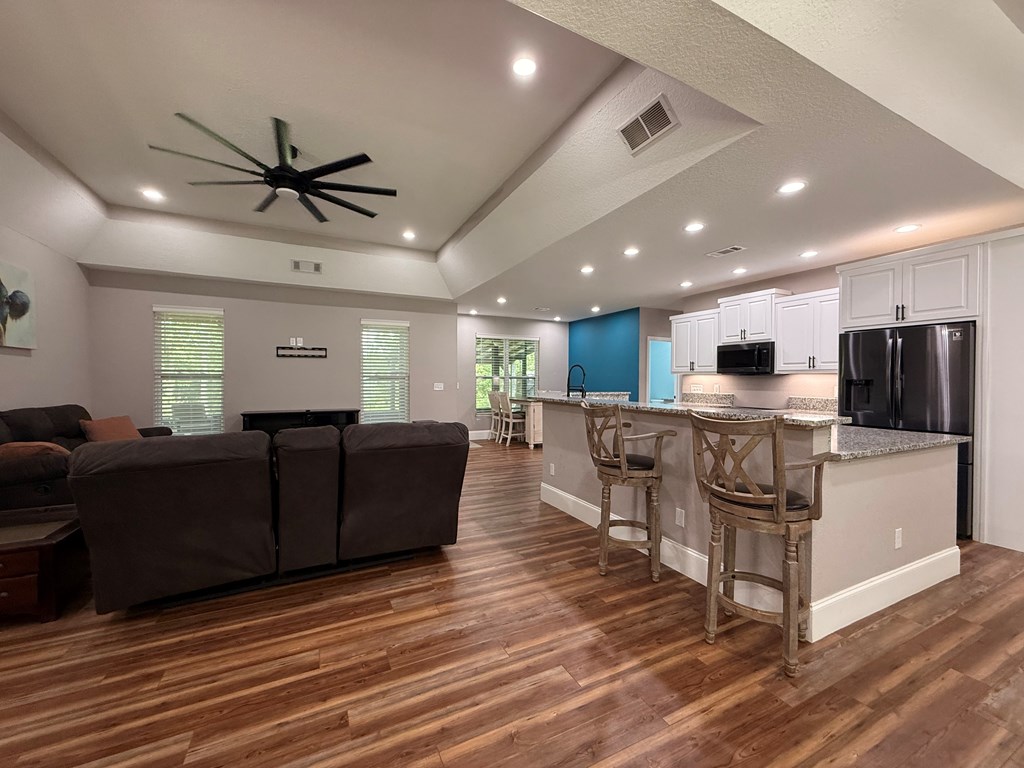 415 Autumn Ridge Drive Mineral Bluff, GA 30559 - Photo 7 of 21 a living room with furniture and kitchen view