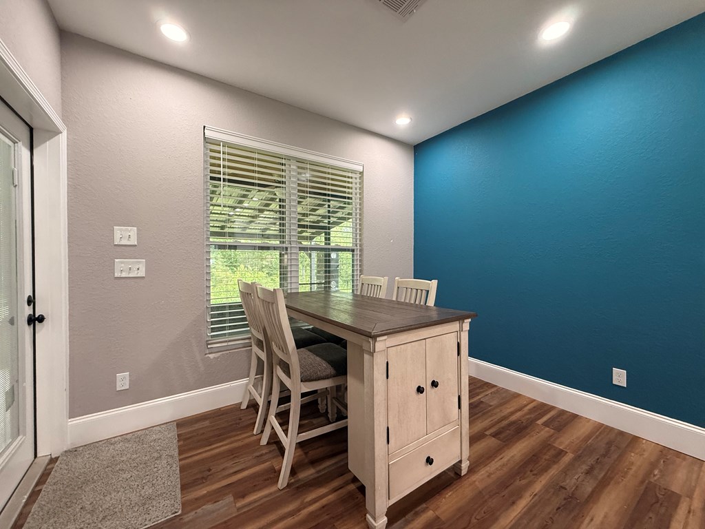 415 Autumn Ridge Drive Mineral Bluff, GA 30559 - Photo 9 of 21 a view of a workspace with furniture and wooden floor
