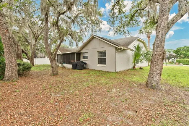 a house with a tree in the background