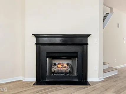 a living room with a fireplace