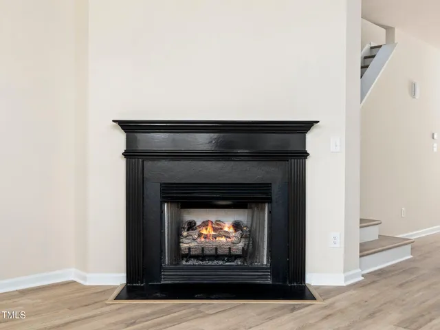 a living room with a fireplace