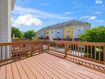 a view of a brick building from a balcony
