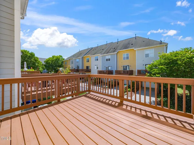 a view of a brick building from a balcony