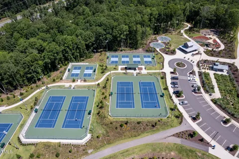 a aerial view of a house with a yard