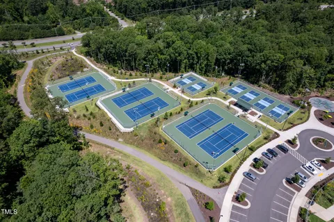 an aerial view of a house with a garden