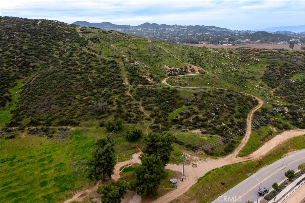 27277 Garbani Road Menifee, CA 92584 - Photo 3 of 21 a view of a city with mountain