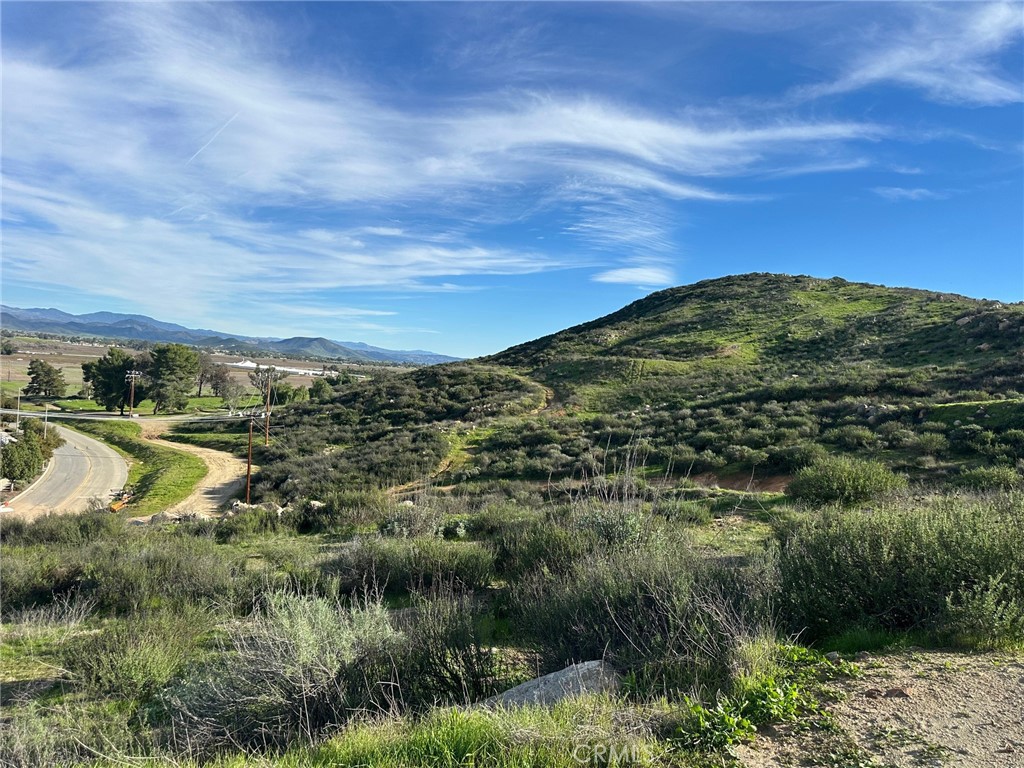 27277 Garbani Road Menifee, CA 92584 - Photo 10 of 21 a view of a lake with a yard