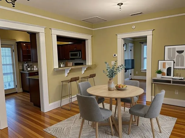 a view of a dining room with furniture