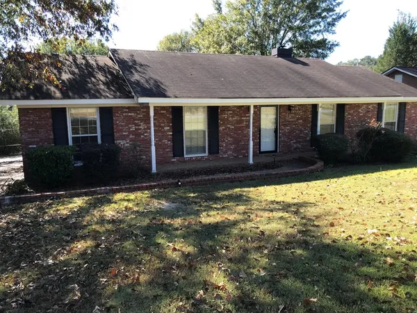 a view of house with outdoor space